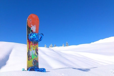 Snowboard in snow