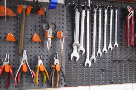 Tools hanging on a pegboard