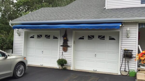 7 Reasons to Get New Garage Doors Plus 8 Things to Consider 2 retractable awning over garage d